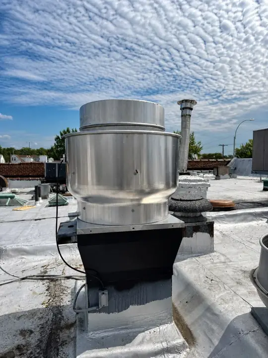 Commercial rooftop exhaust fan installation