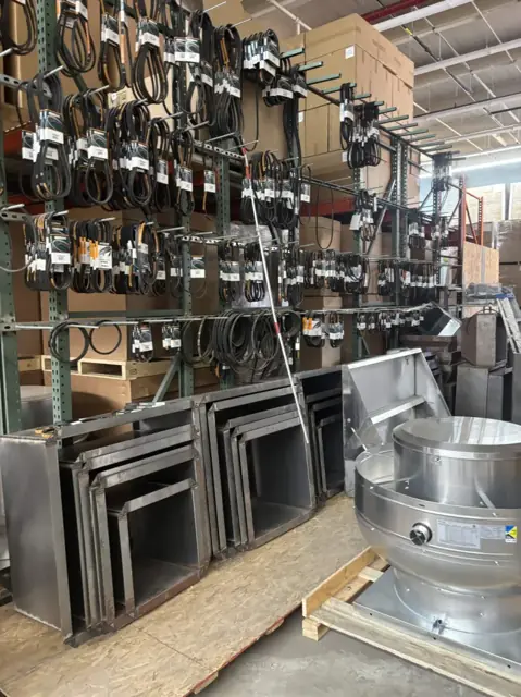 Belt wall, duct sections and an upblast fan in our Brooklyn shop