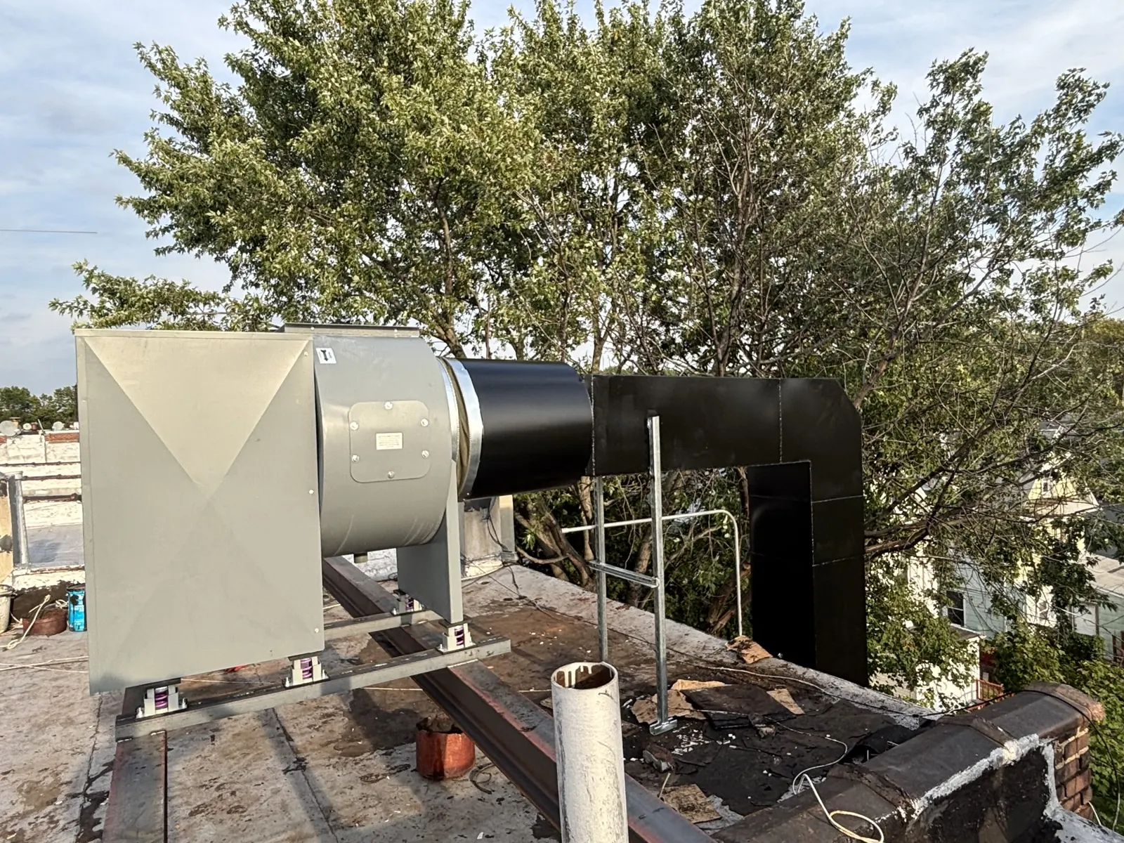 New rooftop exhaust fan on structural steel after the rebuild